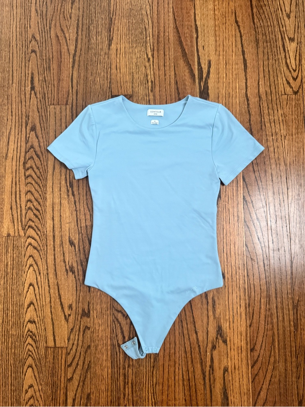 Aritzia Baby Blue Short Sleeve One-Piece Bodysuit